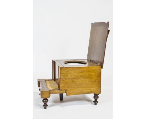 A Victorian walnut step commode, on turned tapering legs, 43cm high x 46.5cm wide x 44.5cm deep