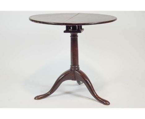 A George III tripod table with birdcage structure, 70cm high x 76cm diameter