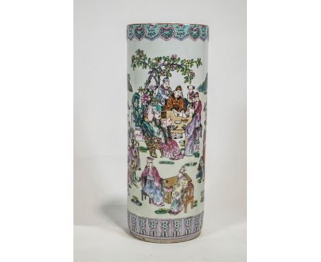 A Chinese porcelain stick stand, decorated in the famille rose palette with scholars&nbsp; and musicians in a landscape on a 