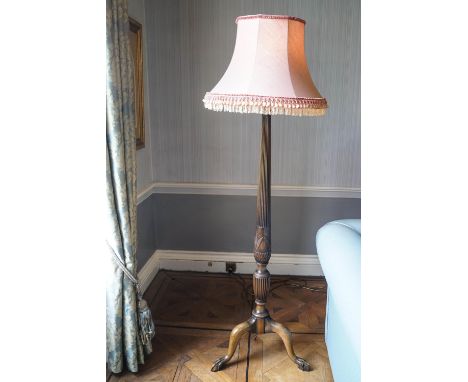 A mahogany standard lamp on cabriole legs with ball and claw feet, 188cm high