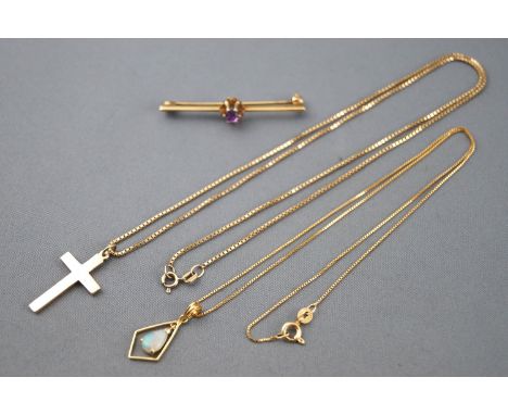 A collection of jewellery to include: A hallmarked 9ct gold cross pendant with chain; A hallmarked 9ct gold amethyst set bar 