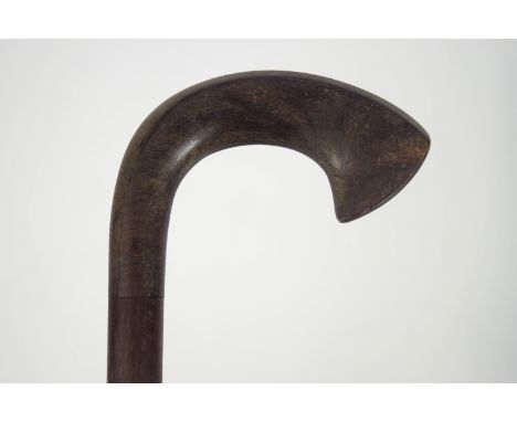 A hardwood walking stick with hardwood handle, 84cm high