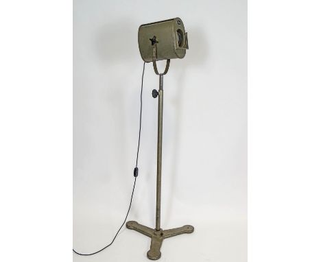 A Furse spotlight on adjustable stand, now converted as a standard lamp, 162cm tall