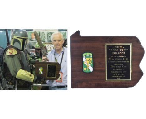 Estate of Jeremy Bulloch - Star Wars - a plaque presented to Bulloch by the Mav Oya'la Clan costuming group. Wooden plaque, w