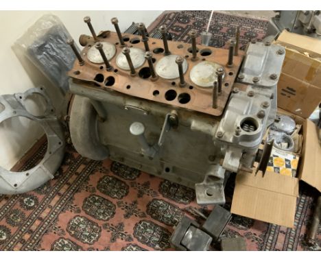 A Classic Car Engine and other accessories including Gearbox an unused sets of pistons and other accessories The Lea Francis 