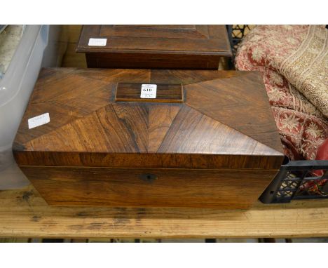 A rosewood sarcophagus shaped tea caddy and an oak box.