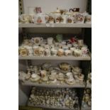 A large quantity of Royal Commemorative and Coronation china to include cups, mugs, teapots,