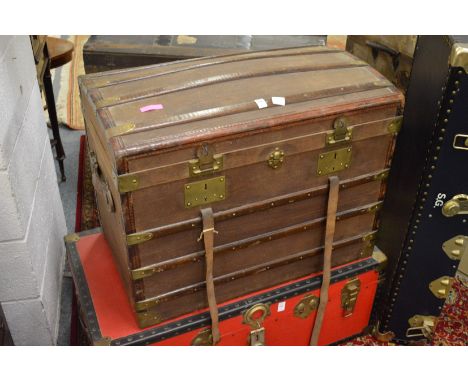A good wood and canvas covered dome topped trunk.
