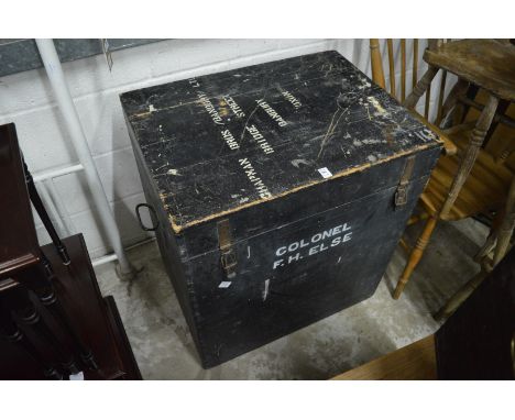 A large painted wooden trunk.