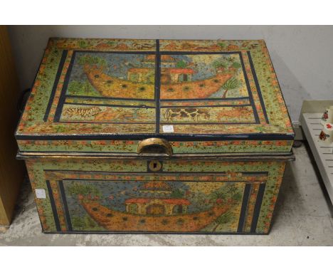 Decoratively painted tin trunk.