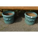 A pair of glazed planters.