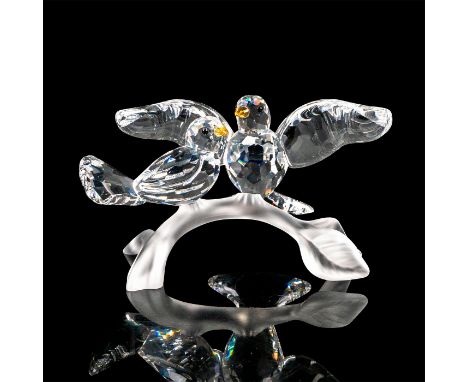 Two Crystal turtle doves perched on an opaque crystal branch. The turtle doves are clear crystal with black crystal eyes and 