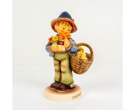 Porcelain hand painted in matte finish. Goebel backstamp. Impressed M. I. Hummel to base. Dimensions: 3"L x 2.25"W x 5.5"HMan