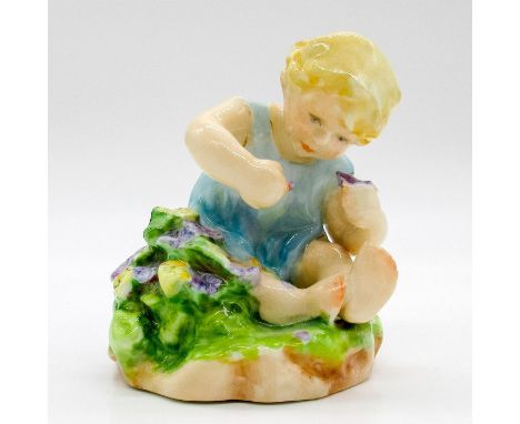 Modeled as a child in blue dress playing with flowers. Royal Worcester backstamp.This item has no reserve. Artist: M. CaneIss