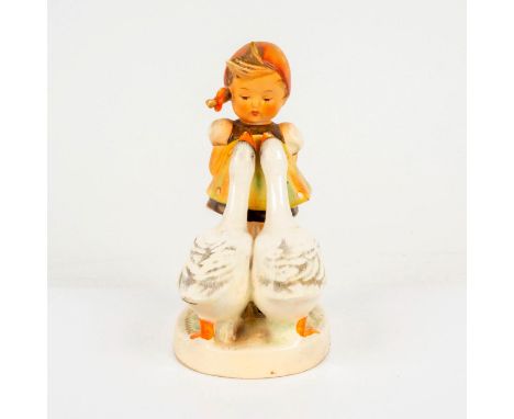 Porcelain hand painted in matte finish. Goebel backstamp. Impressed M. I. Hummel to round base. Dimensions: 3.25"L x 2.25"W x