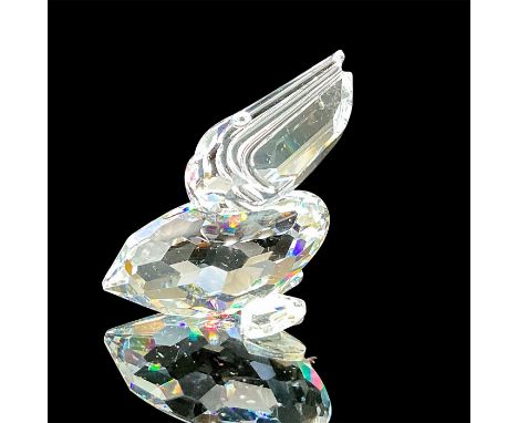This retired Swarovski crystal pelican was part of the Feathered Friends collection. It is made from clear crystal, with no f