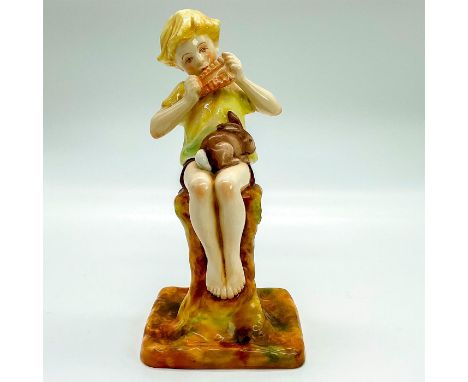Fine bone china figure of Peter Pan wearing a yellow shirt, seated on a tree stump with a rabbit. Royal Worcester backstamp.T