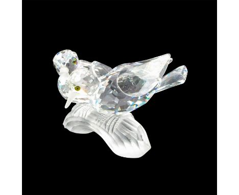Brilliant clear crystal SCS Annual Edition figure of two cuddled lovebirds on a branch. Swarovski etched on end of branch. Th