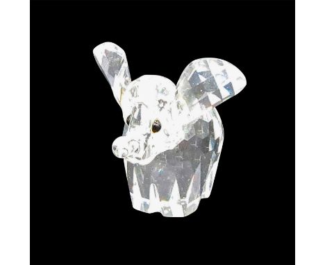 This retired Swarovski crystal elephant was originally a member of the African Wildlife group and was later moved to the Rare