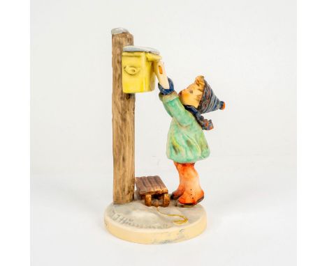 Porcelain hand painted in matte finish. Goebel backstamp. Impressed M. I. Hummel to base. Dimensions: 4"L x 3.75"W x 7.25"HMa
