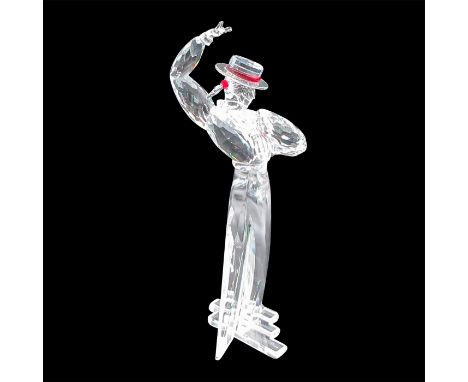 Depicts a flamenco dancer gentleman made of clear crystal with red crystal used for the accent. This item has its original bo