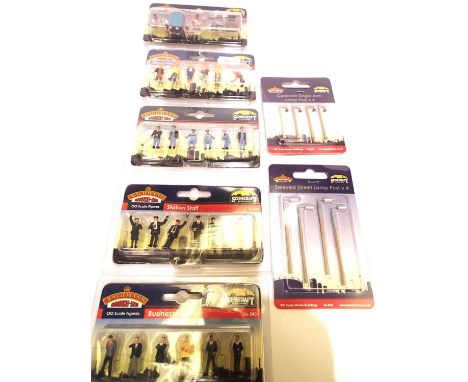 Bachmann accessory packs x7; street lamps x2, businessmen, station staff, train crew, construction workers, site tools. P&amp
