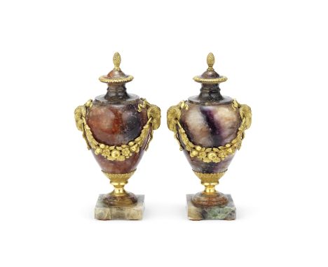 A pair of 19th century French gilt bronze mounted 'Blue John' fluorspar garniture vases (2)The inverted pear shaped bodies wi