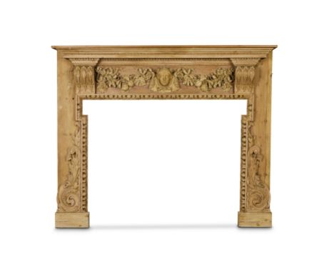 A mid 18th century carved pine chimneypiece of impressive proportionsThe moulded rectangular shelf beneath an egg and dart an