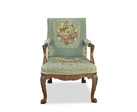 A George II mahogany library armchairCirca 1755, possibly by William BradshawWith acanthus and shell clasped arm supports and