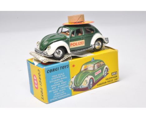 Corgi No. 492 Volkswagen European Police Car. Green and white with brown interior, chrome hubs. Displays mostly excellent wit
