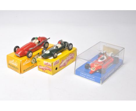 Trio of racing issues from Solido x 2, and one other as shown. With original boxes.