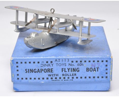 Dinky aircraft No. 60h Singapore Flying Boat with roller. Displays generally good, albeit some fatigue crazing to nose. In go