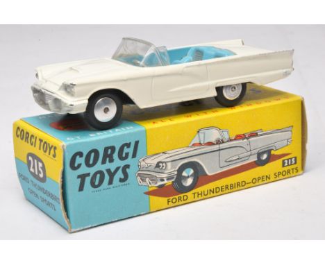 Corgi No. 215 Ford Thunderbird Open Sports. White with blue / silver interior, flat hubs. Displays very good with minor signs