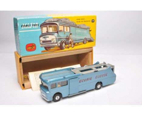 Corgi No. 1126 Ecurie Ecosse Racing Car Transporter. Light metallic blue with red lettering. Spun hubs. Displays mostly excel