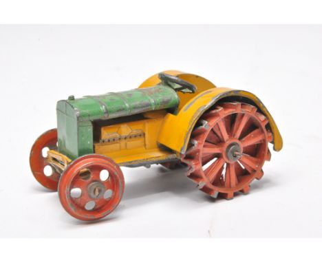 Dinky No. 22e pre-war Tractor. Green and yellow. Displays generally fair to good. Replacement tow hook plus wear throughout.