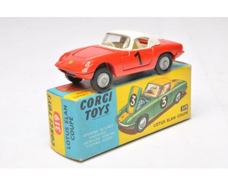 Corgi No. 319 Lotus Elan Couple. Red, white with off-white interior and cast hubs. Displays very good with the odd minor sign