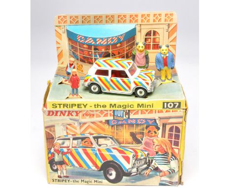 Dinky No. 107 Stripey - The Magic Mini (Gerry Anderson). Complete with figures and back drop, as shown. Displays generally ve