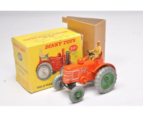 Dinky No. 301 Field Marshall Tractor. Green painted metal wheels. Displays generally excellent. Little sign of wear. In very 