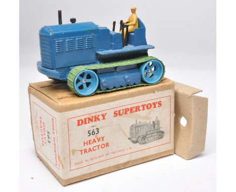 Dinky No. 563 Heavy Tractor. Blue including Rollers. Green Tracks. Displays generally excellent. The odd minor sign of wear a