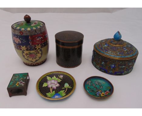 A quantity of Cloisonn‚ to include two dishes, a match striker box, two covered pots and a brass and enamel bowl and cover