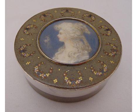 A French 19th century tortoiseshell circular snuff box, the pull off cover with a miniature portrait and inlaid three coloure