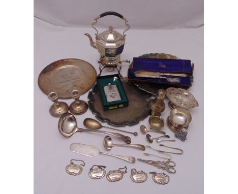 A quantity of silver plate to include trays, a tea kettle on stand and candlesticks