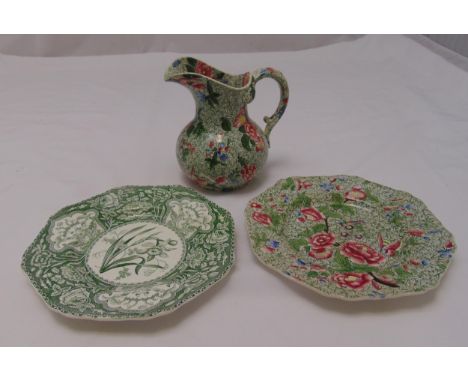 A Spode jug of pear shape with scroll handle and two decorative octagonal Spode plates (3)