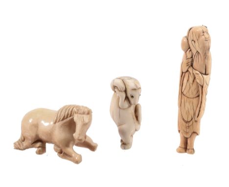 An Ivory Netsuke of a Sennin, the bearded figure wearing loose robes An Ivory Netsuke of a Sennin, the bearded figure wearing