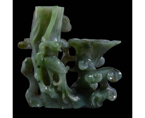 An attractive Chinese spinach jade vase, Qing Dynasty, 18th/19th century An attractive Chinese spinach jade vase, Qing Dynast