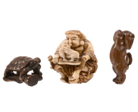 Sogyoku: An Ivory Okimono of Daikoku seated on his sack with his mallet... Sogyoku: An Ivory Okimono of Daikoku seated on his