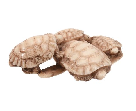 Tomochika: An Ivory Netsuke carved as four turtles gathered around and on... Tomochika: An Ivory Netsuke carved as four turtl