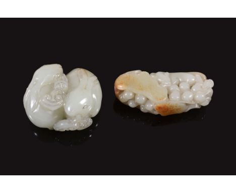 A Chinese white jade carving of two rabbits , with lingzhi, 4 A Chinese white jade carving of two rabbits , with lingzhi, 4.5