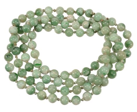A Chinese jade necklace, late Qing Dynasty A Chinese jade necklace, late Qing Dynasty , comprising 106 circular beads suspend