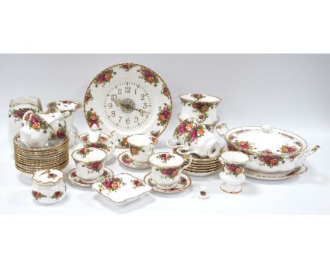 Royal Albert 'Old Country Roses' Table China, of approximately thirty-nine pieces, all first quality, plus clock.